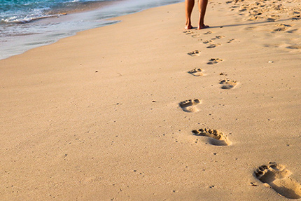 Fußschritte im Sand