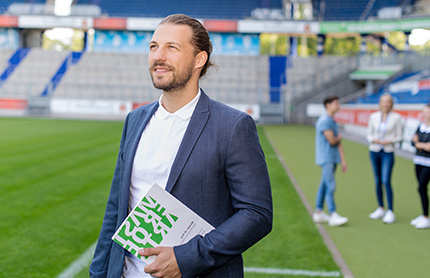 Fußballmanager im Stadion